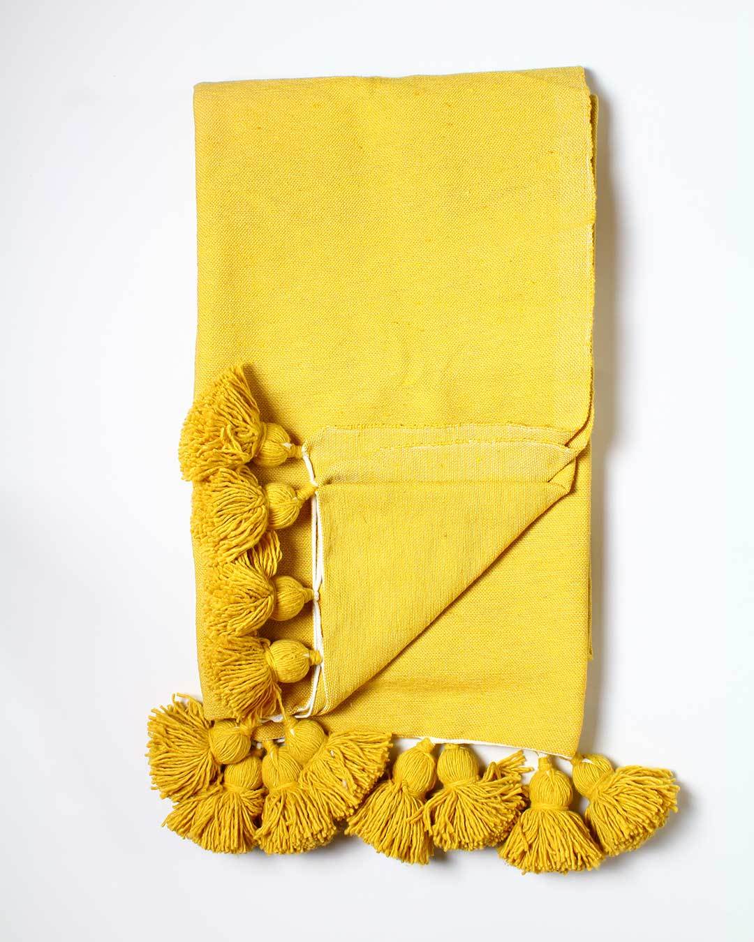 mustard moroccan pompom blanket