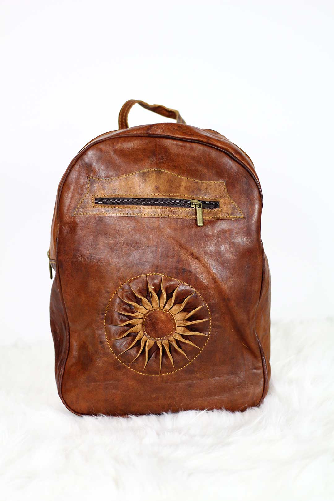 chestnut sun leather backpack