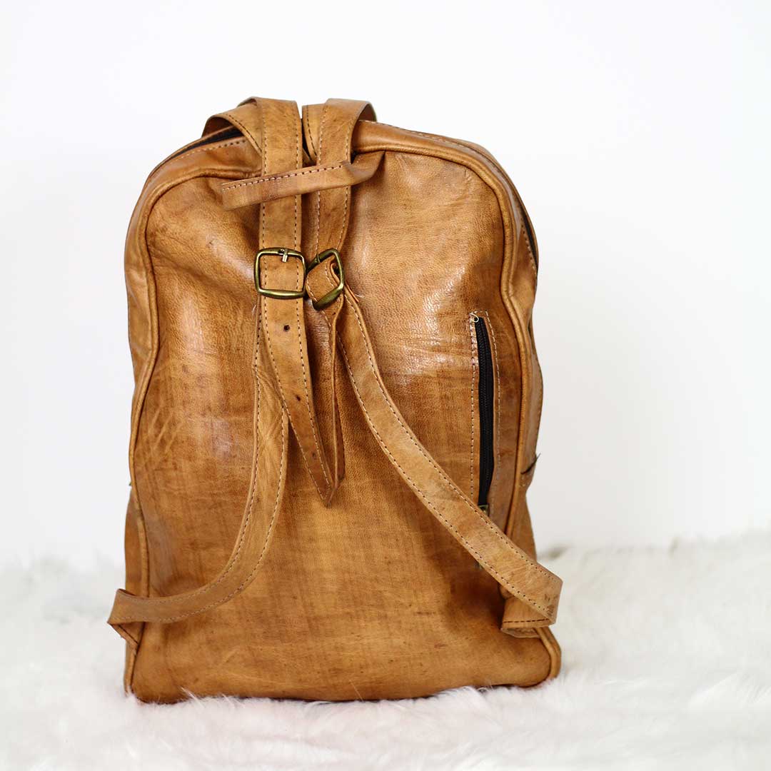 camel sun leather backpack