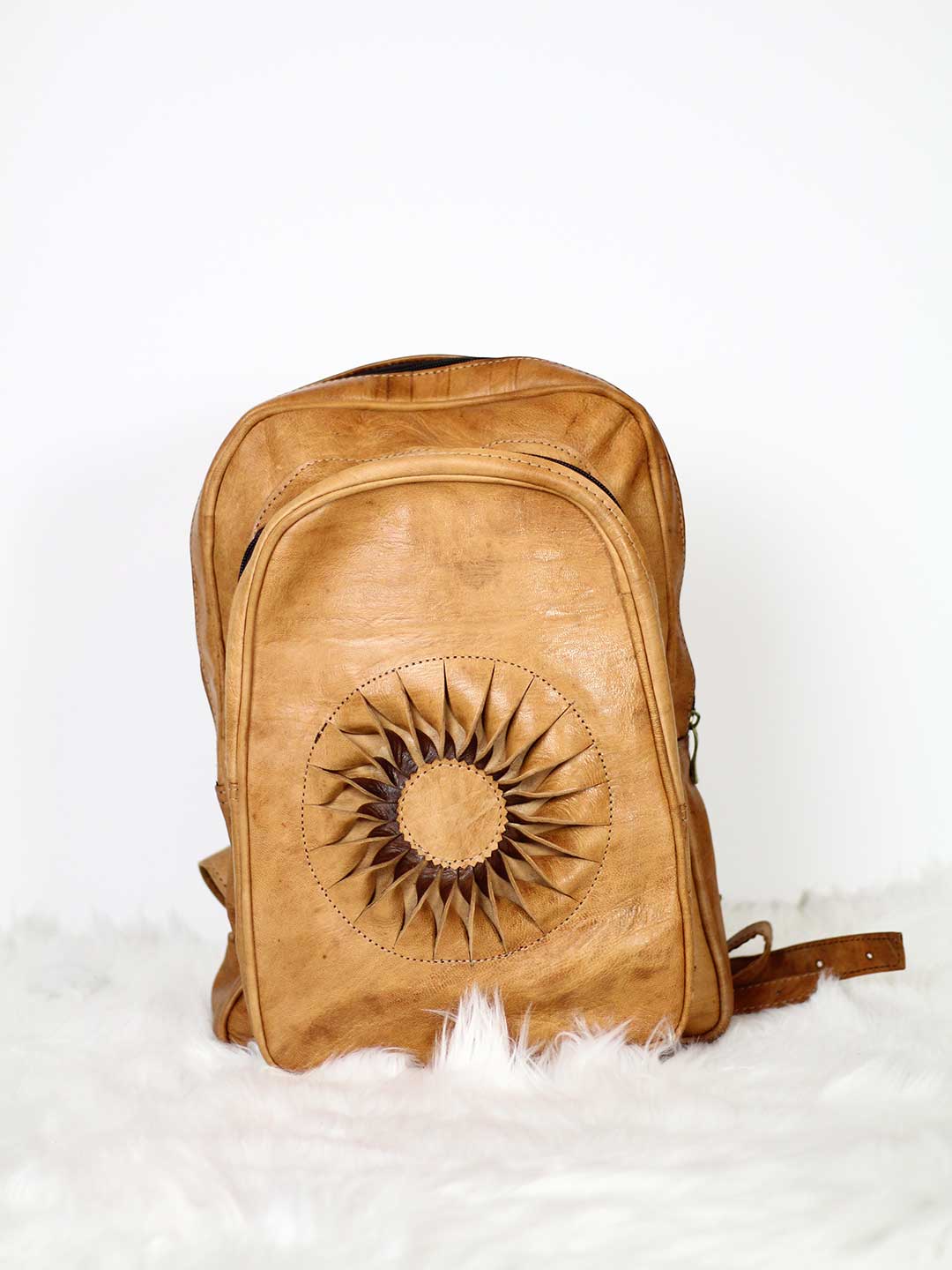 camel sun leather backpack