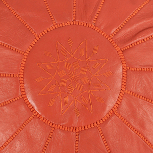 orange moroccan pouf.
